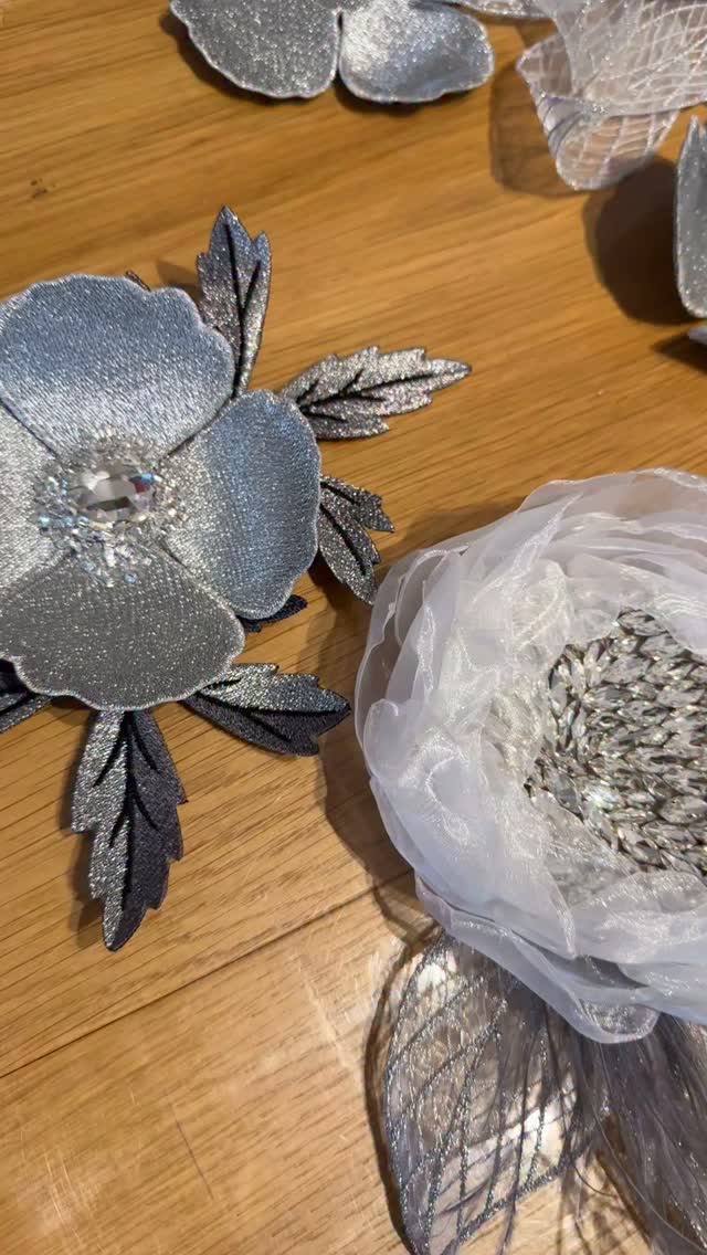 Silver Brooch Cushion by Baysal Home, A decorative cushion design with a silver brooch accent for silver-toned cushions.